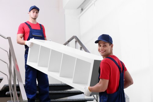 Removal team protecting furniture during a Battersea move