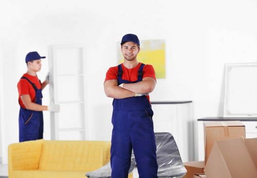 Office removals planning in Battersea with moving boxes and workspace setup