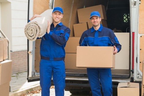 Moving boxes and furniture prepared for a Battersea flat removal