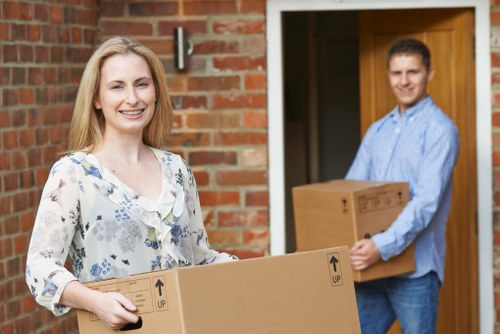 Removal team estimating a two-bedroom flat move in Battersea