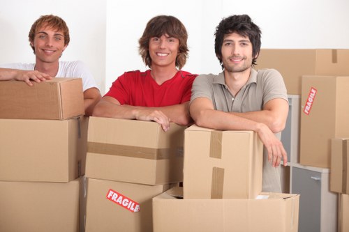 Business relocation team handling office equipment in Battersea